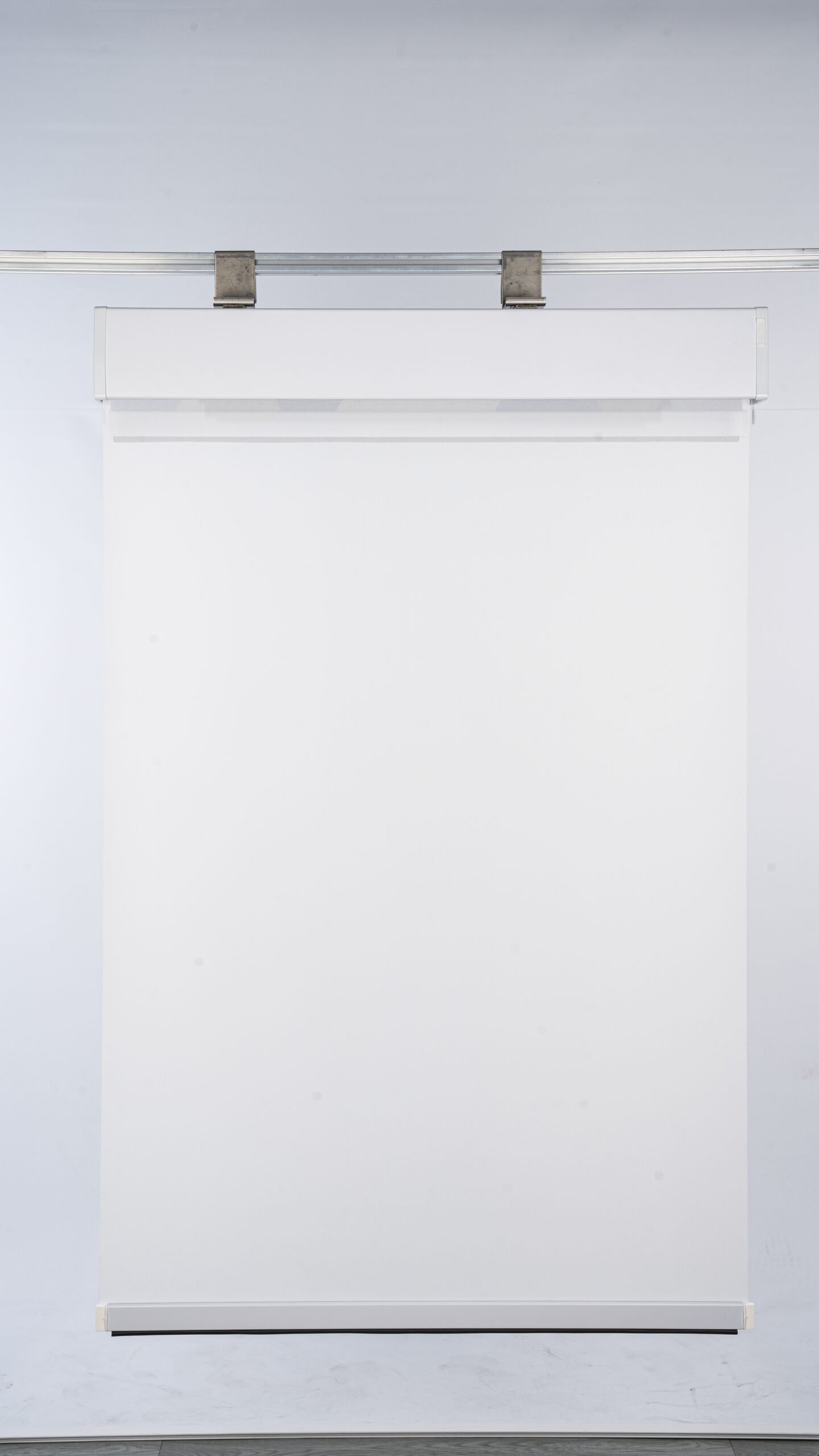 Minimalist white roller blind for window privacy