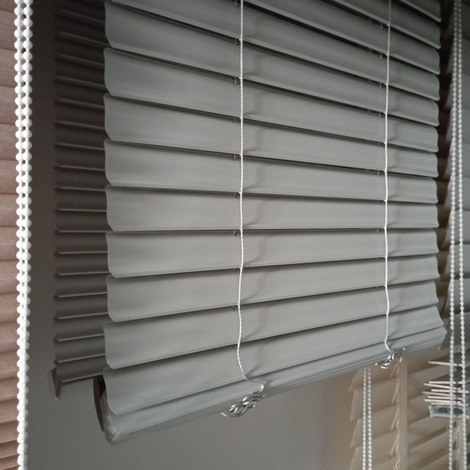 close-up of gray blinds, showcasing durable and stylish design