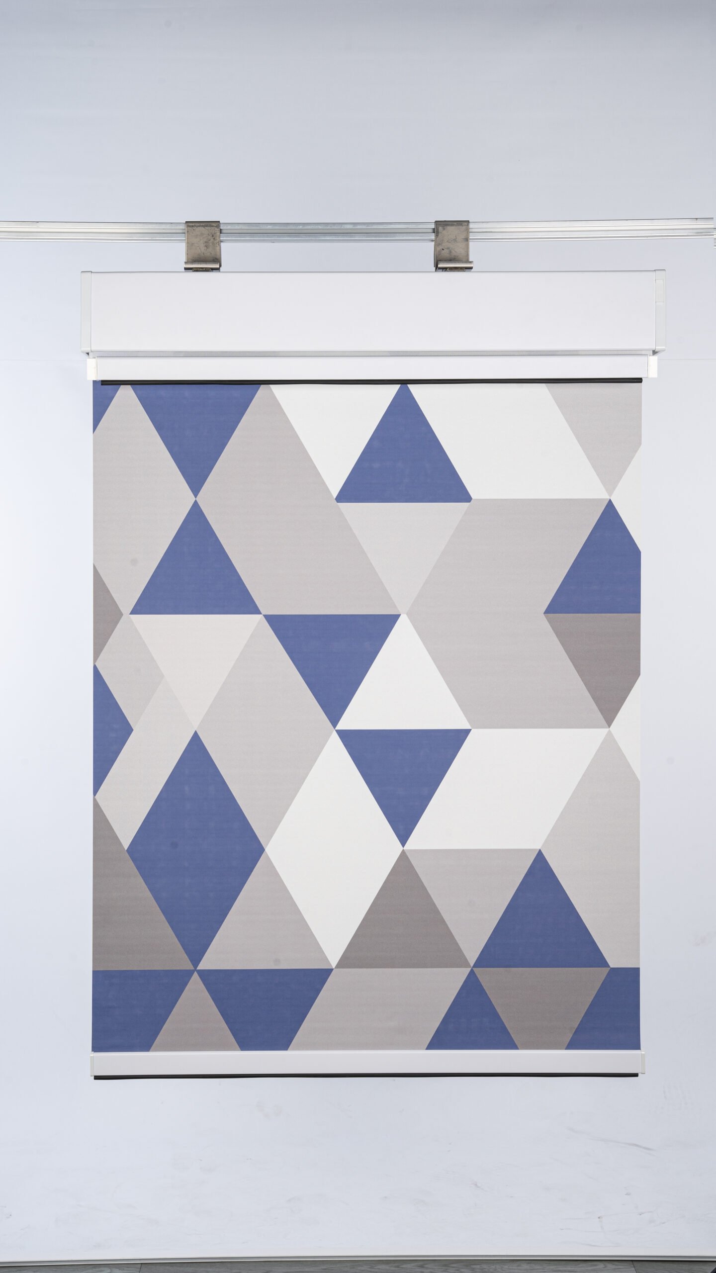 Modern roller blind with bold triangle pattern
