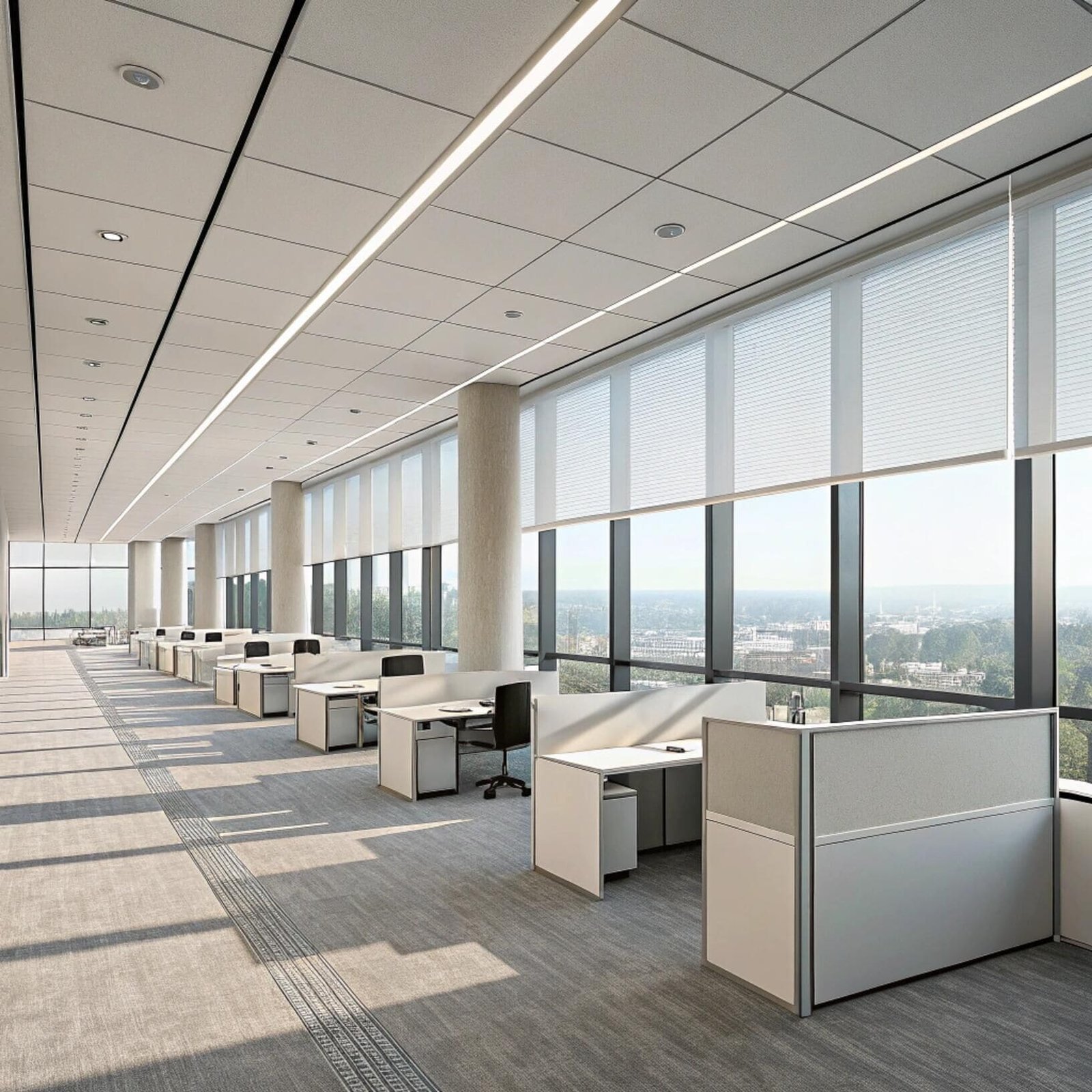 Open plan office with smart window blinds and workstations
