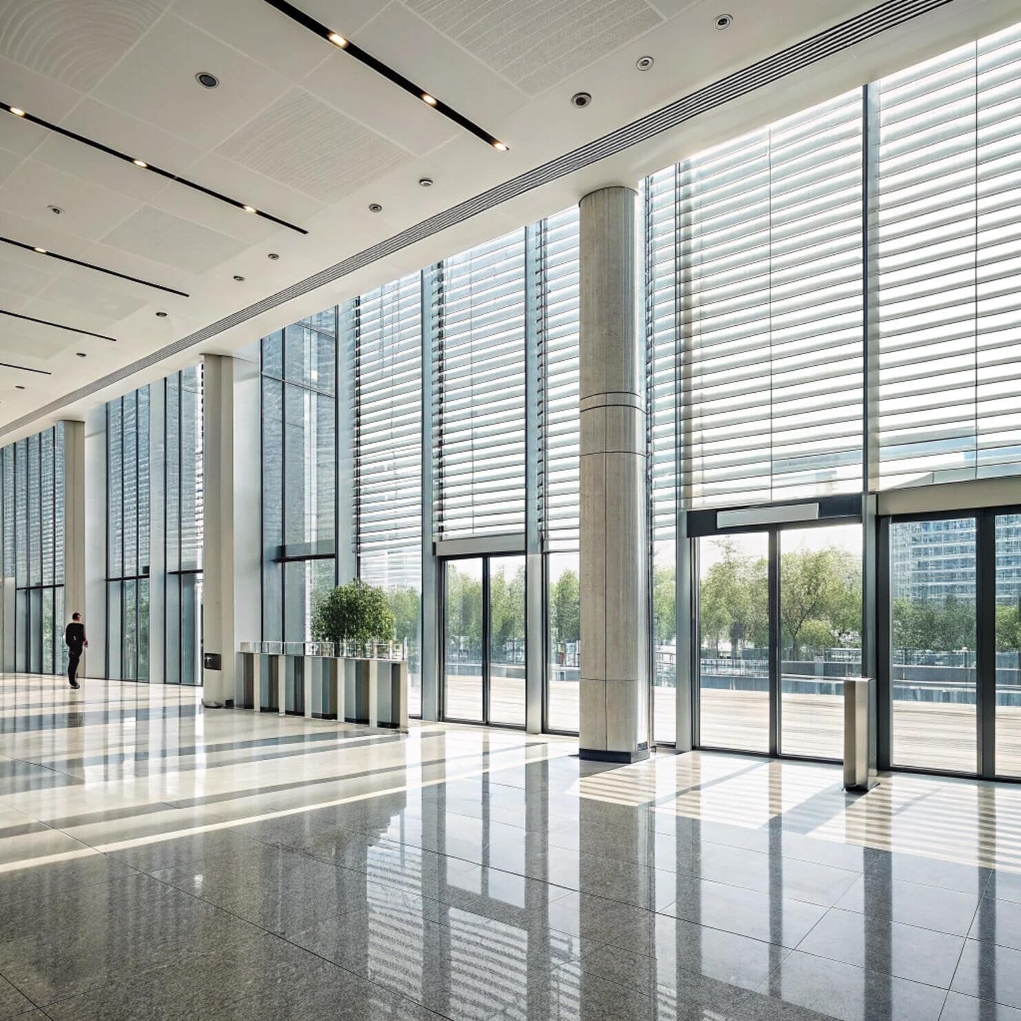 Large lobby with silver aluminum blinds and pillars