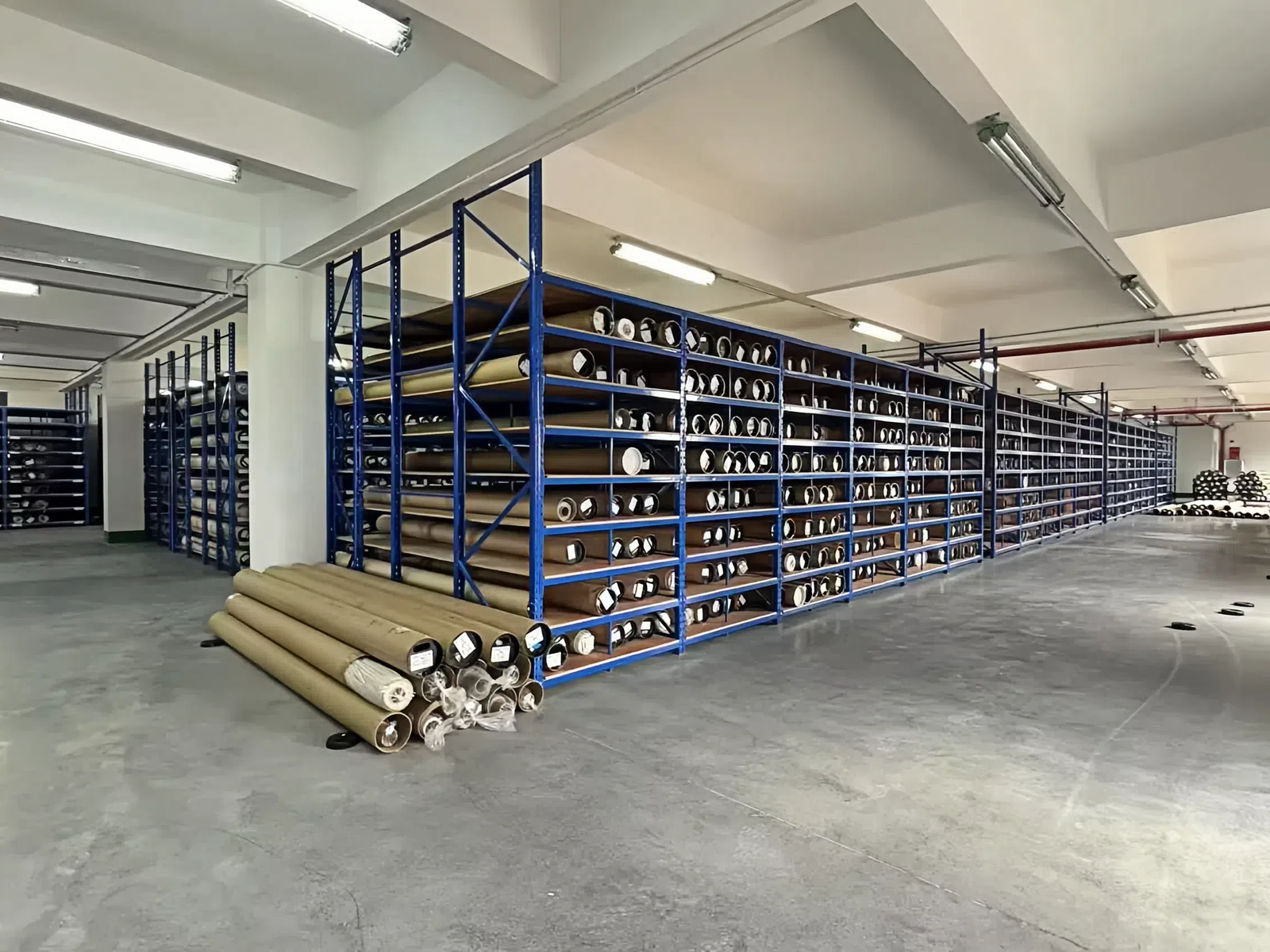 Storage racks filled with materials, ready for manufacturing process