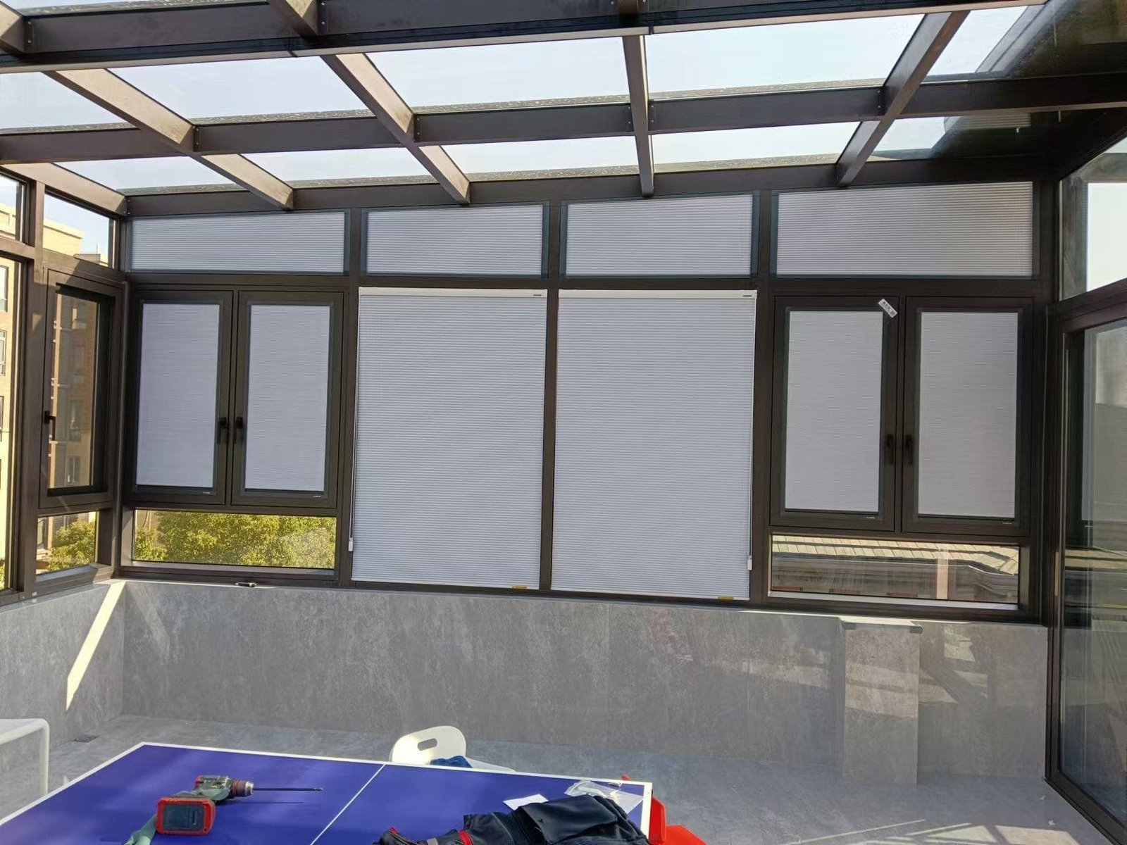 sunroom with pleated shades, maximizing light control and privacy
