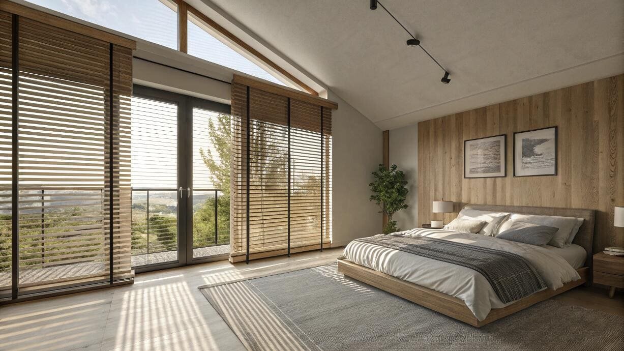 Bedroom with large windows, angled ceilings, and natural wood blinds