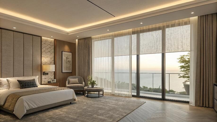 Luxury bedroom with ocean view and layered roller shades for light control