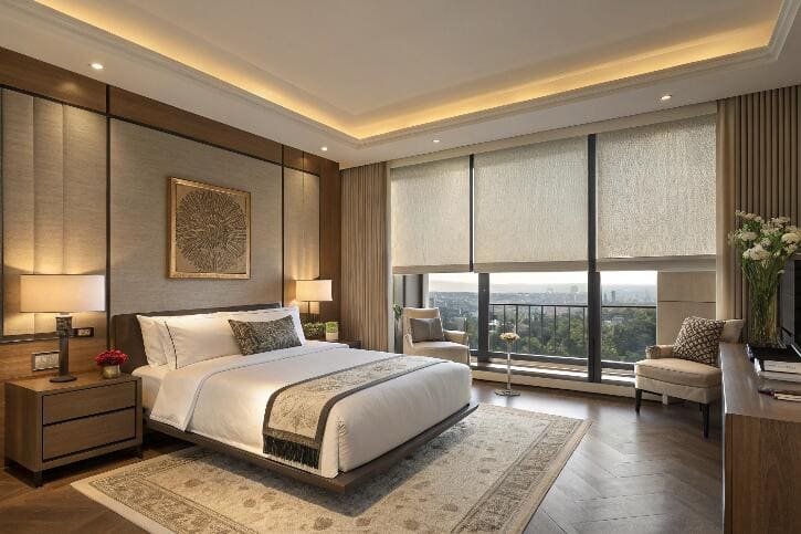 Luxury bedroom with floor-to-ceiling blackout roller blinds