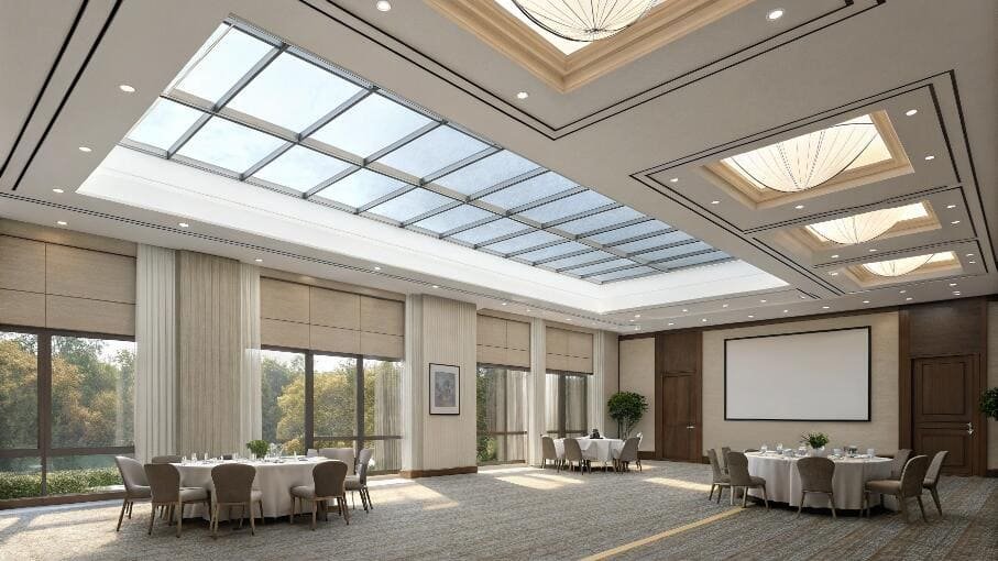Banquet hall features blackout roller shades for large windows and skylights