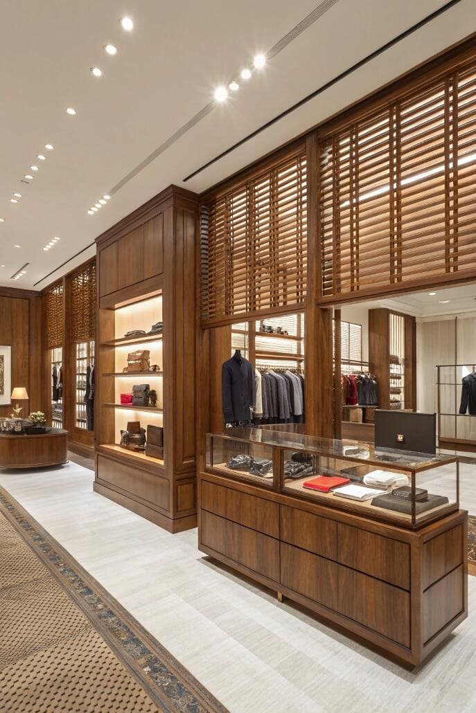 Luxury retail store with custom wooden slatted window coverings and displays