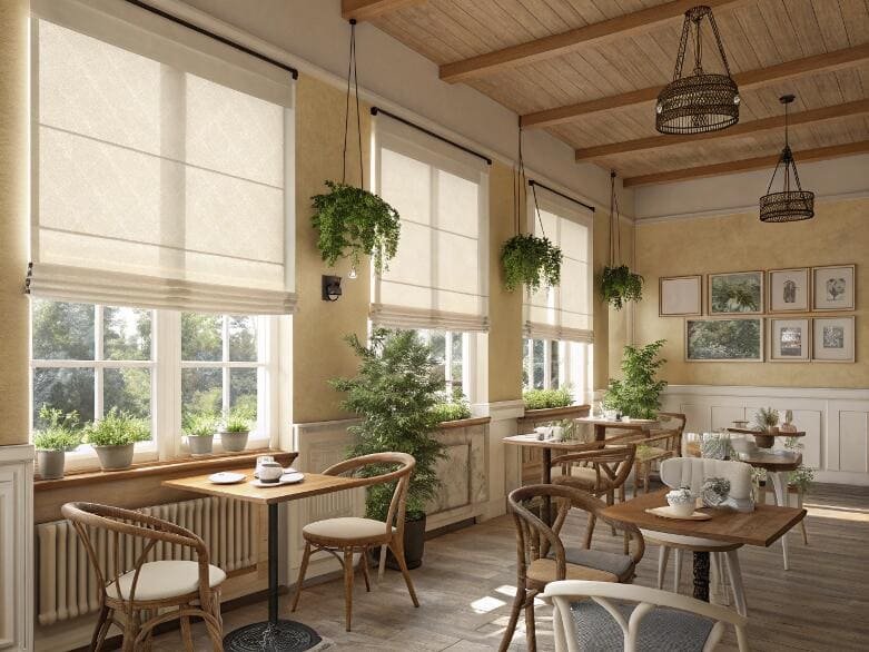 Cozy cafe with traditional cream roman blinds