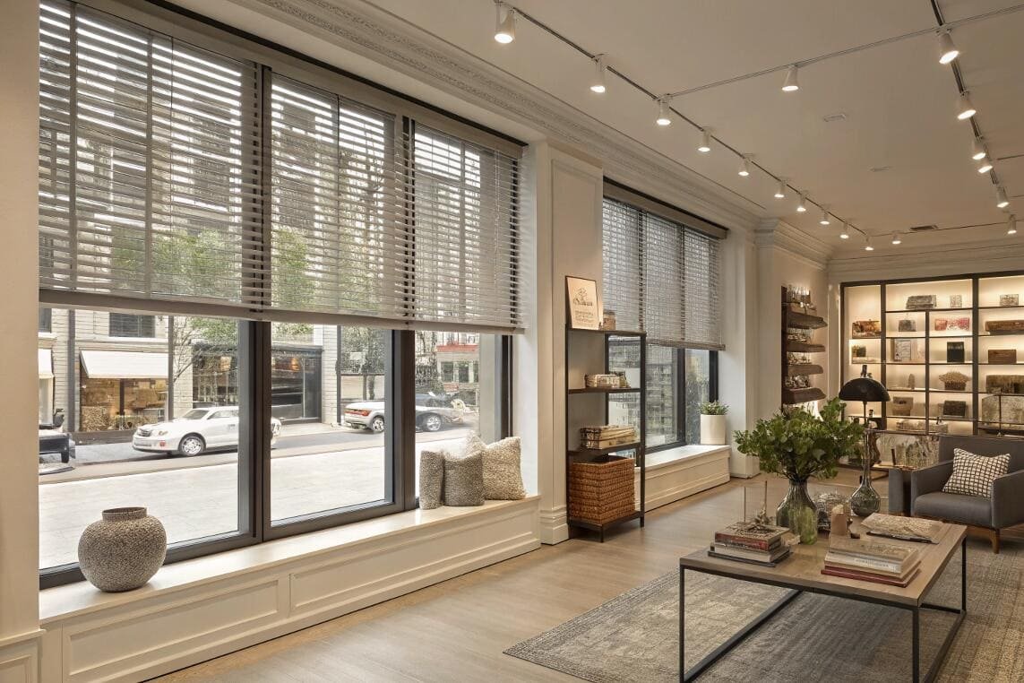 Home decor boutique uses aluminum venetian blinds for sunlight control