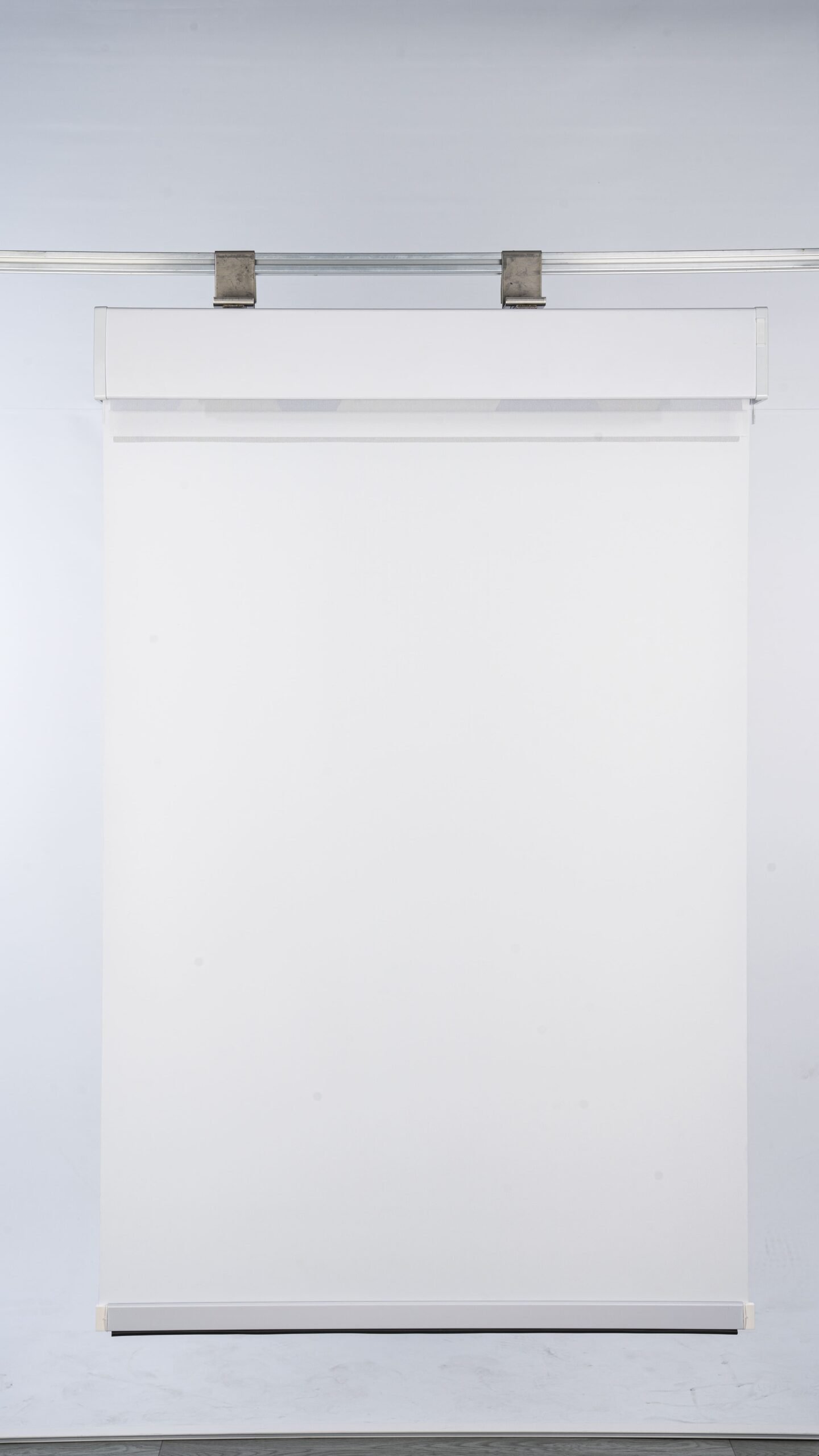 White translucent layer of dual smart roller blind