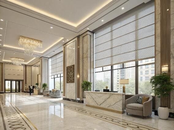 Hotel lobby with elegant motorized roman blinds