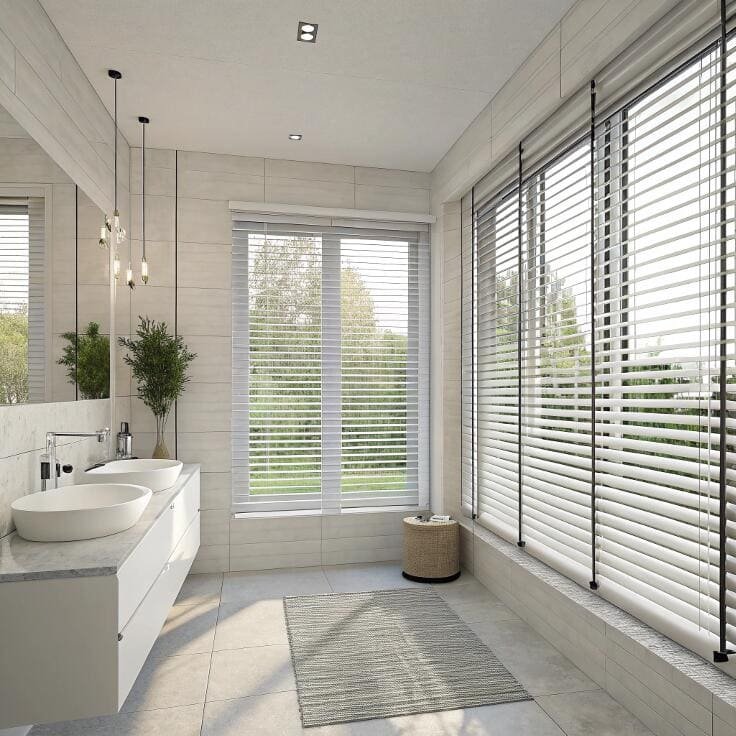 Elegant bathroom with white faux wood blinds