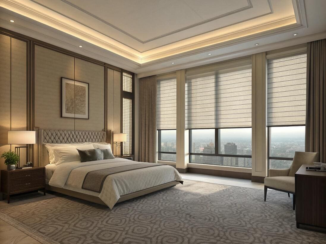 Luxurious hotel bedroom featuring elegant, automated Roman shades on tall windows.