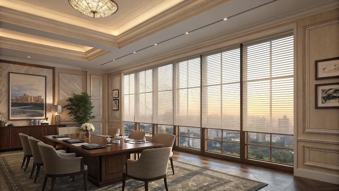 Light-filtering sheer shades create an elegant atmosphere in a classic executive boardroom.