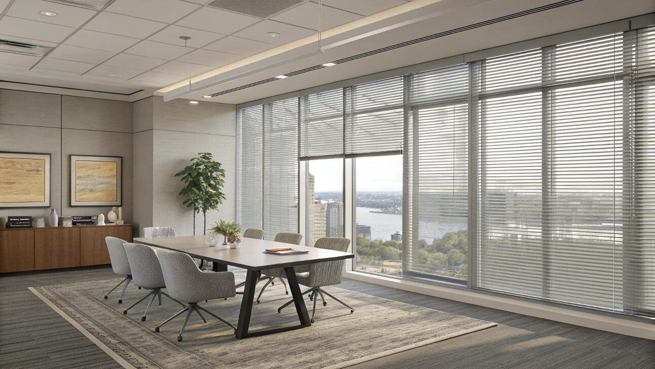 Professional conference room with commercial venetian blinds for light and privacy control.
