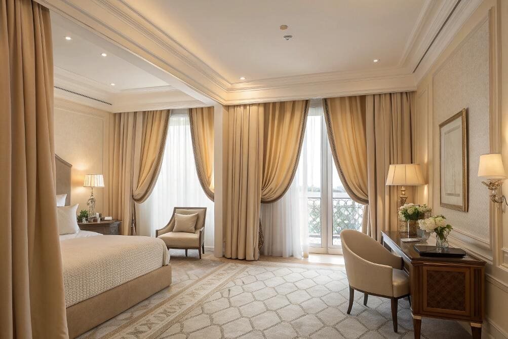 Luxurious bedroom with custom golden drapes.