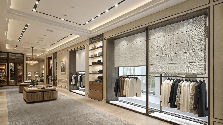 Upscale retail boutique with sophisticated Roman shades on large storefront windows.