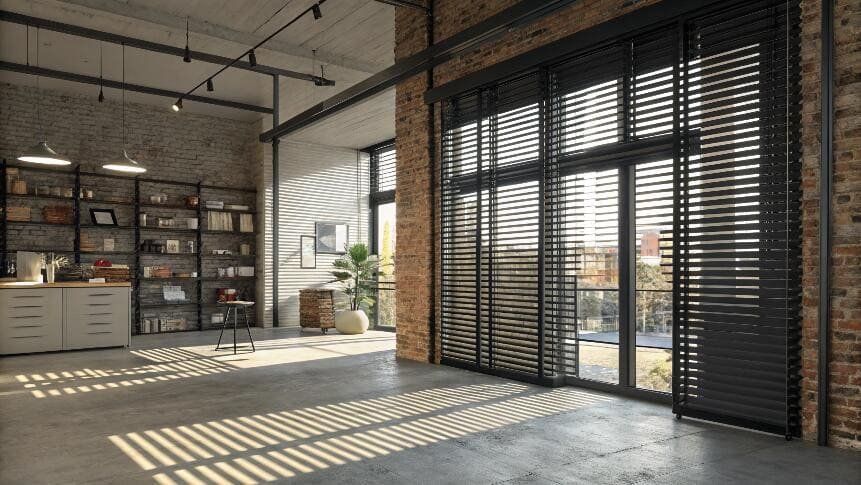 Industrial loft with large windows and sleek black horizontal blinds.