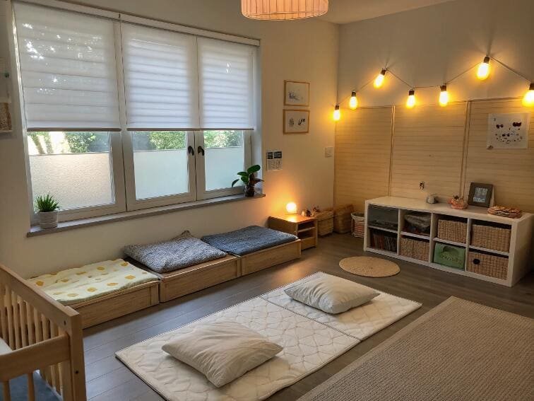 Light-filtering shades in a daycare or Montessori classroom with floor mats.