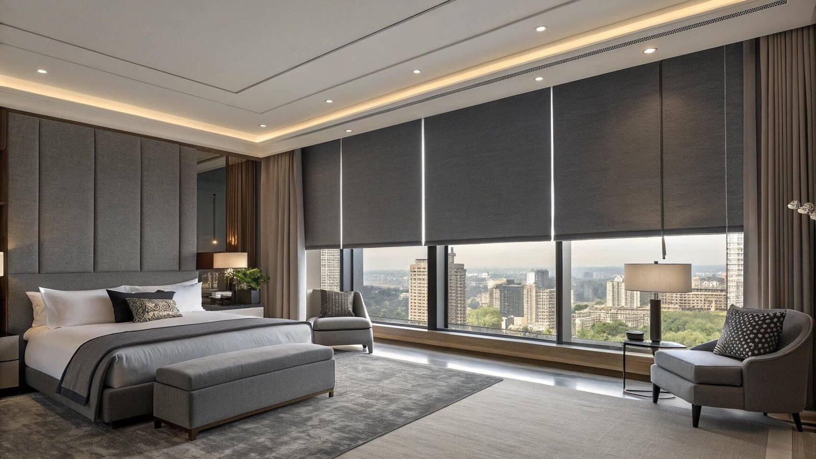 Floor-to-ceiling blackout roller shades in a luxury high-rise hotel-style bedroom.